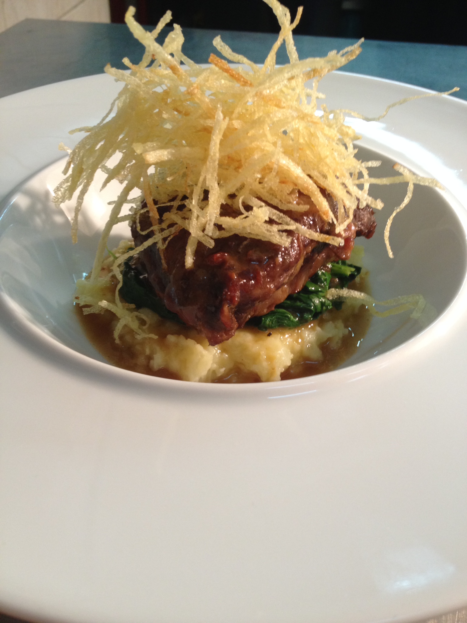 Braised beef cheeks with red wine, cardamon and lemongrass